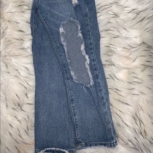 Fashion Nova cropped Mom jeans with cut outs in front
